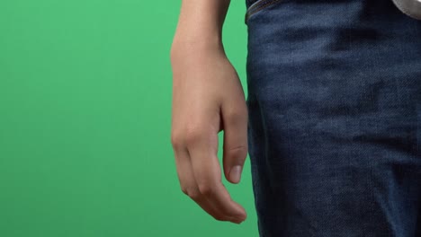 teenager nervously clenched his fists. boy is stressed and nervous. close up hand gesture. emotion, anger, conflict, difficulties