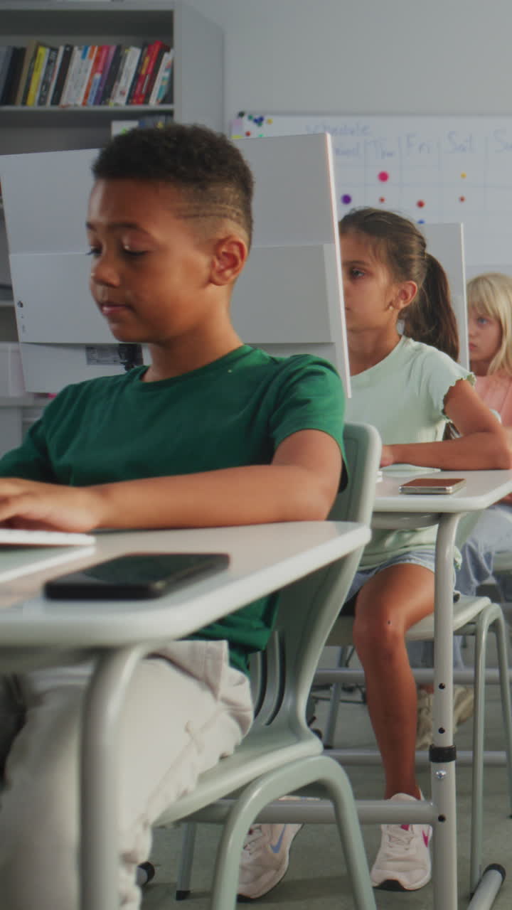 Group of Kids Practicing Digital Skills Studying Programming in ...