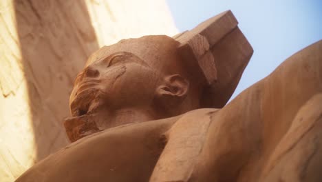 close up of a statue of king ramses in the karnak temple, luxor egypt