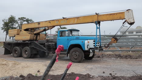 truck crane installing solar panels