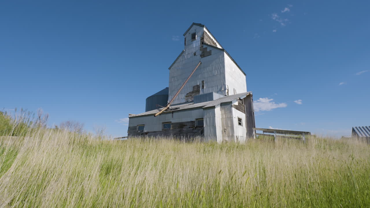 Old Grain Elevator in a Field