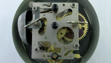 old vintage clock mechanism working, closeup shot with soft focus