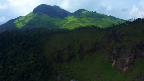 white crater and mountains of ciwidey, bandung, indonesia - aerial shot