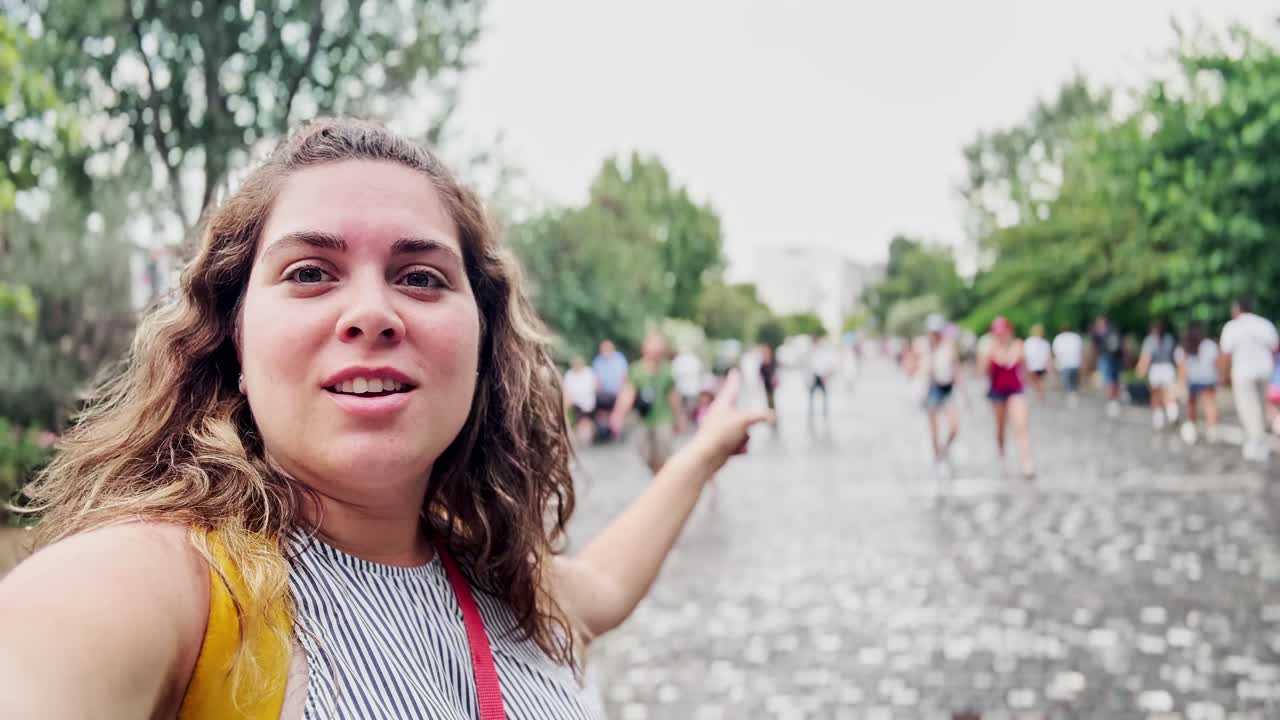 Happy Vlogger Capturing Joyful Moments on Athens Streets