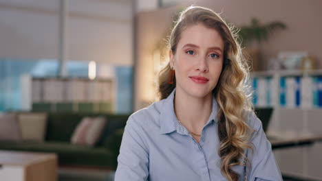 portrait of a blond woman in an office