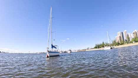 sailboat moves towards shore and docks smoothly