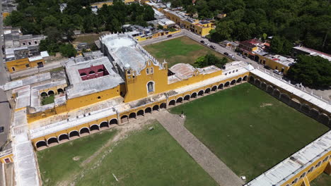aerial of the convent of st. antonio de padua in izamal, yucatán, a vibrant historical and cultural landmark, yellow walls