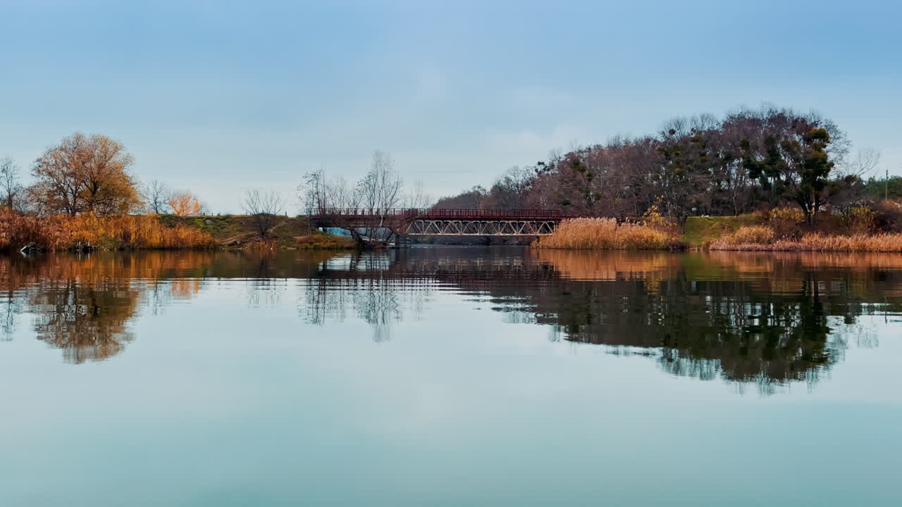 Autumn Bridge Over Calm River