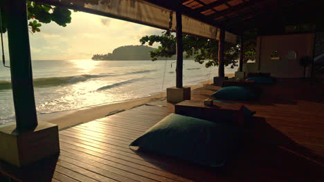 bean bag on balcony with sea beach background at sunrise or sunset time