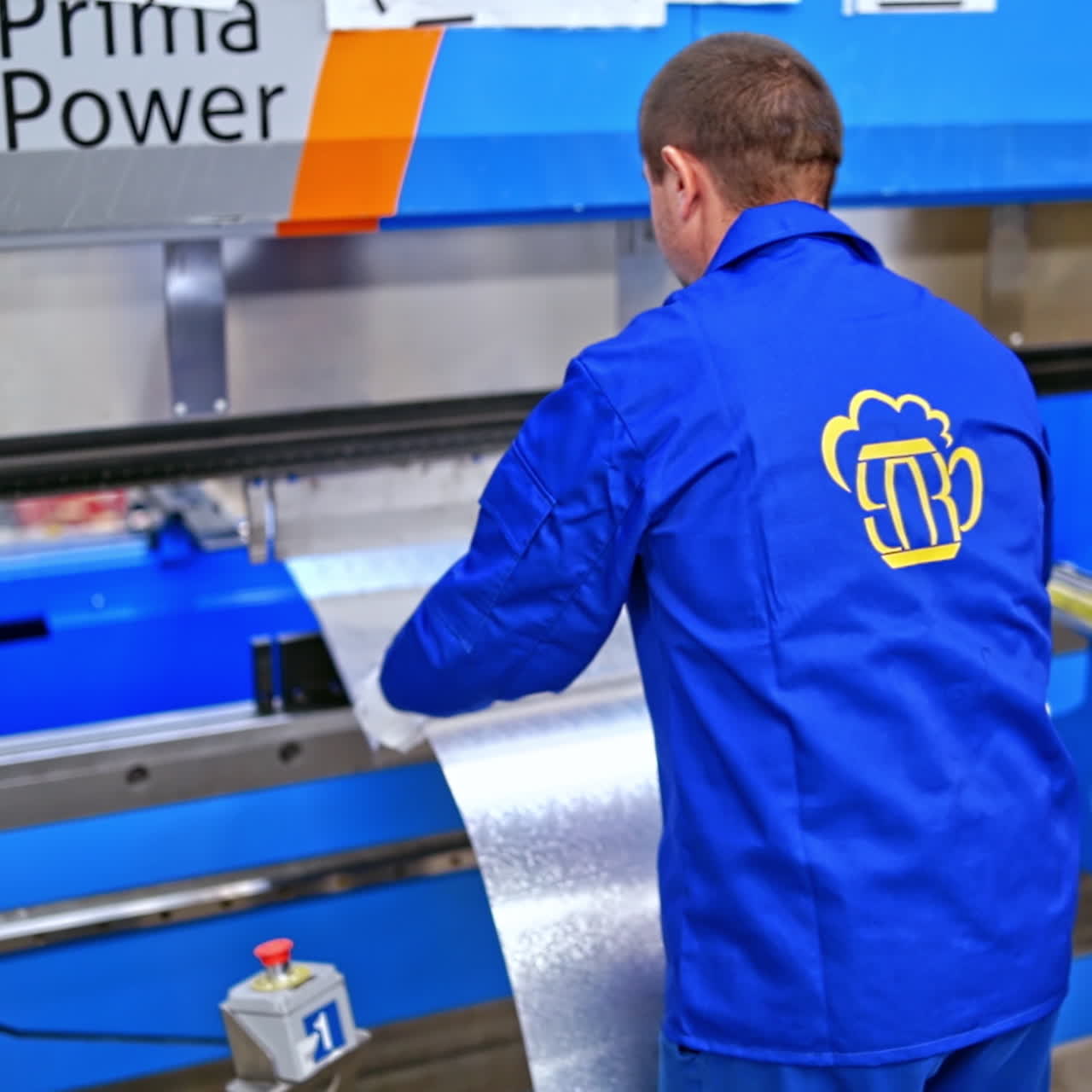 Interior of Industrial working place at factory. Robotic factory line for processing and cutting of metal or steel sheets. Worker at plant in blue uniform. Industrial concept.