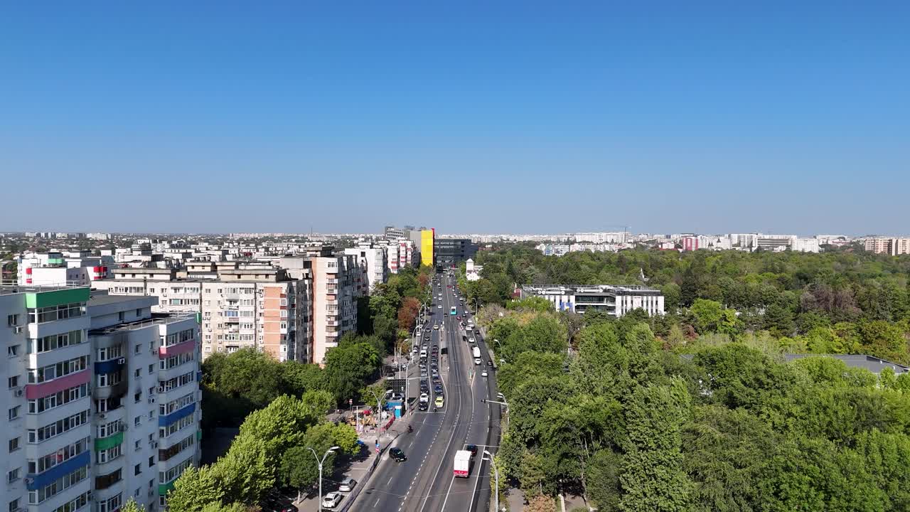 Aerial View of Oltenitei Street with Traffic and Bucharest's Cityscape in the Background, Romania, Europe