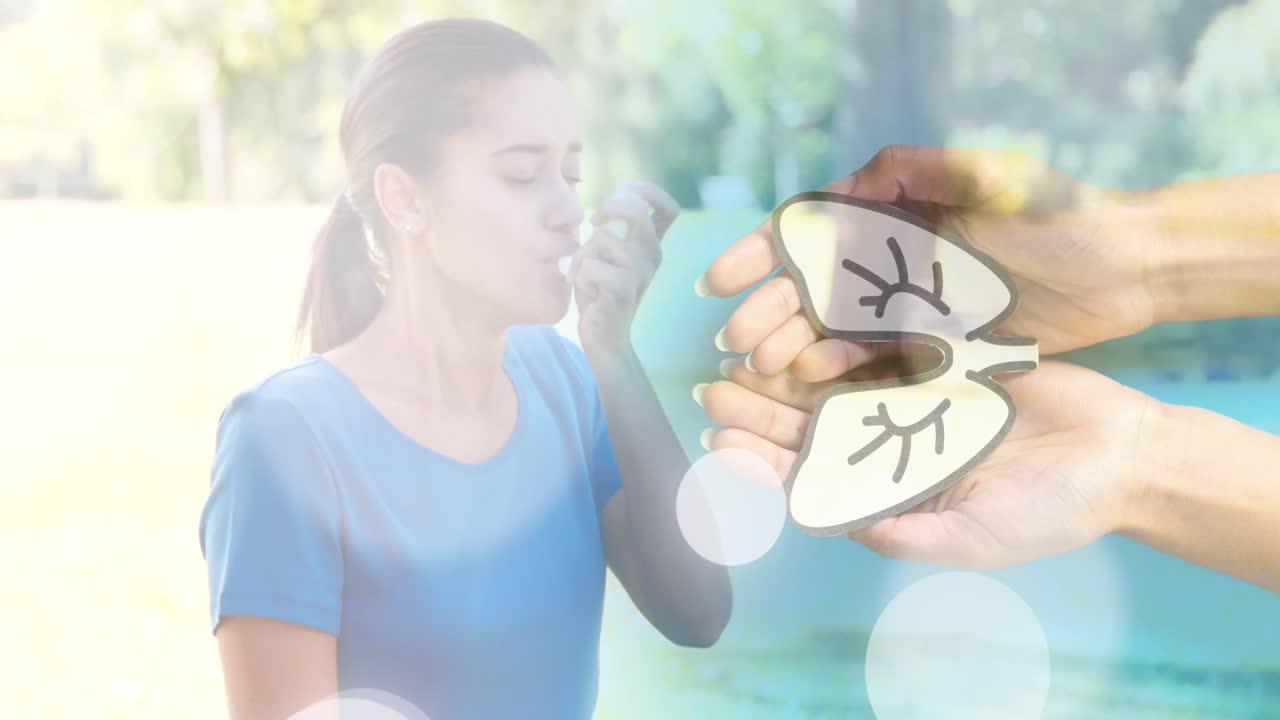 흡입기를 가진 두 인종의 여성 위에 폐를 가진 손의 애니메이션