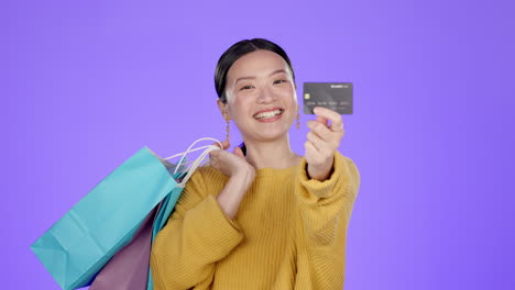 shopping bag, credit card and smile with asian