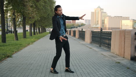 man dancing in a park