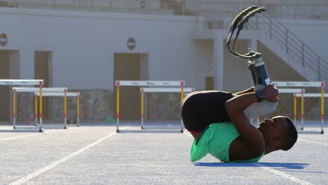 disabled athletic exercising on a running track 4k