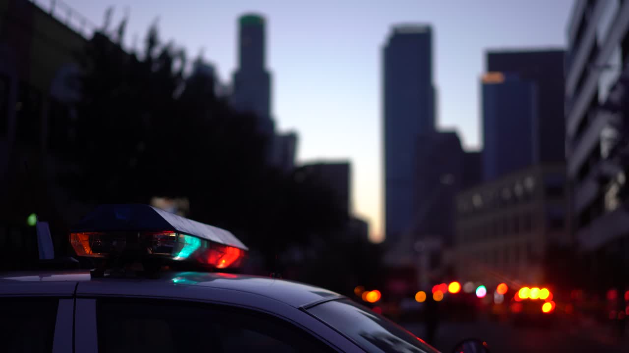Police Car Lights with Downtown Skyline Background, Los Angeles