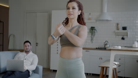 woman stretching at home, couple relaxing