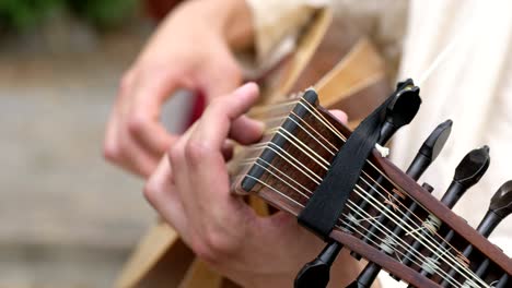 close up on italian musician plays the mandolin