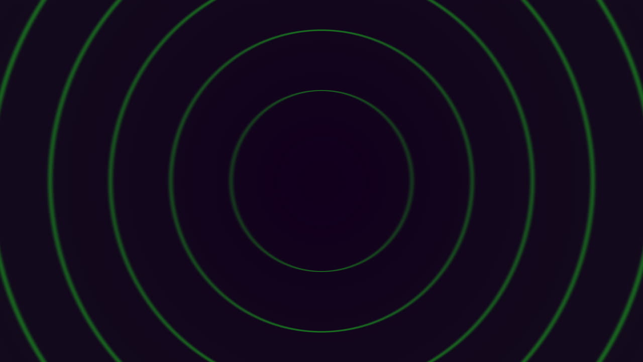 una matriz vibrante de círculos concéntricos coloridos en negro