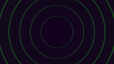 una matriz vibrante de círculos concéntricos coloridos en negro