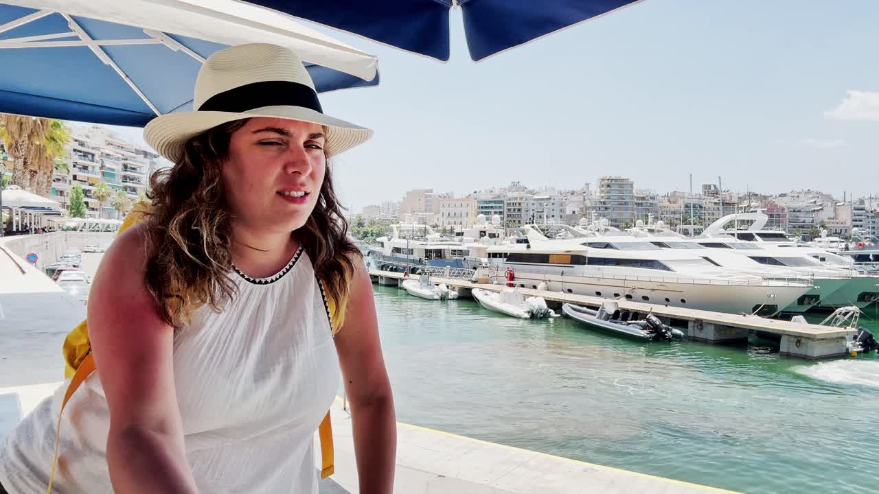 Athens Coastal Cafe: Young Woman in Summer Attire