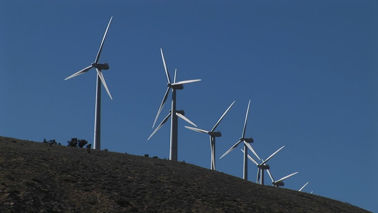 Medium Shot Of Wind Turbines Generating Power In Tehachapi California