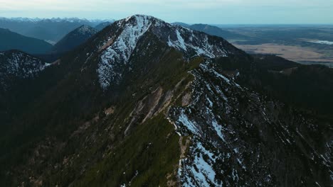cinematic drone aerial at herzogstand mountain top peak