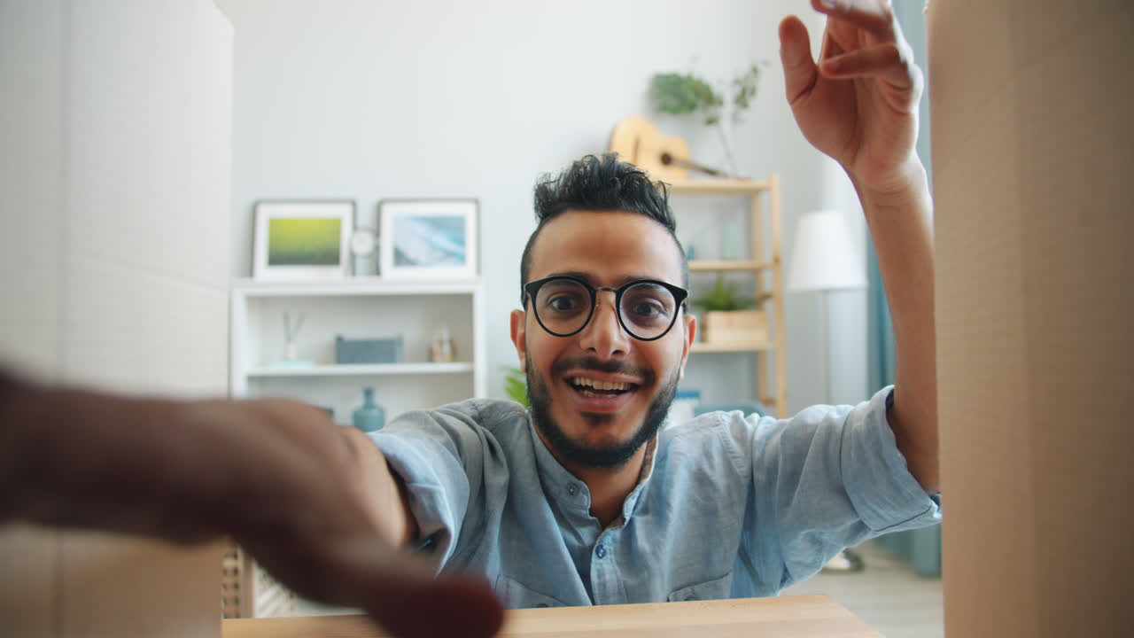 Happy Man Opening a Gift