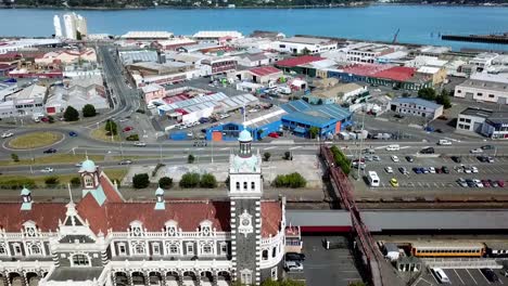 Drone-view-of-the-historic-railway-station-of-Dunedin,-New-Zealand