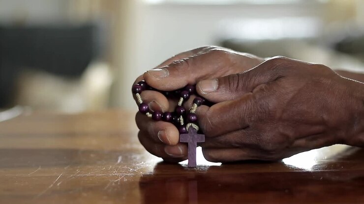 man praying to God with cross hand together with people stock video stock footage