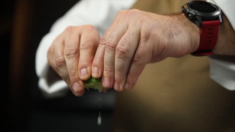 chef squeezing lime