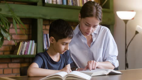 Religion-teacher-reading-the-Bible-with-young-boy