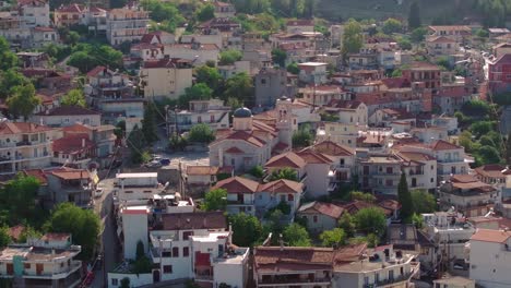 close shot of livadeia residential area with church in the center