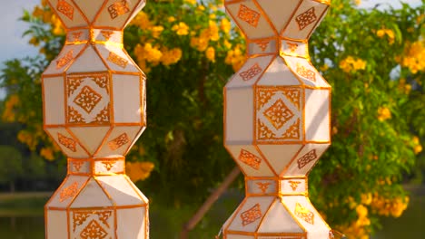 close up of yi peng lanterns waving in slow motion