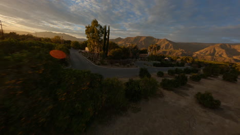 aerial fpv drone shot of street during the sunset road moving in the street