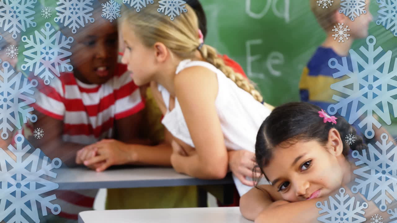 In school, children in classroom with snowflake animation overlaying scene