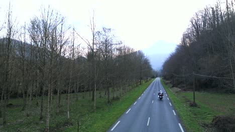 motorcycle ride through a scenic valley