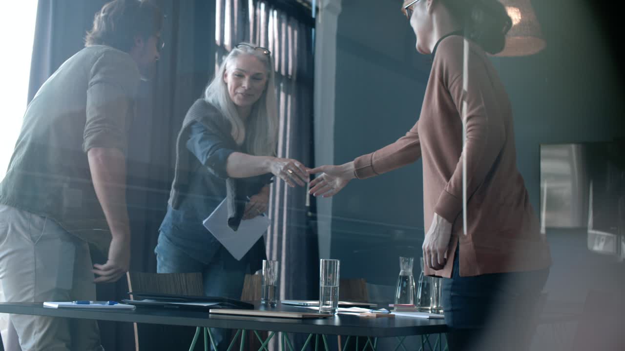 Business partners finishing up a meeting