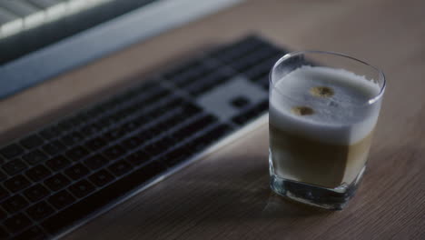 coffee latte on desk waiting for office worker
