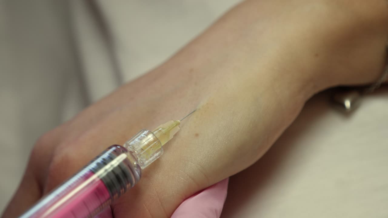 Medical Injection on Hand