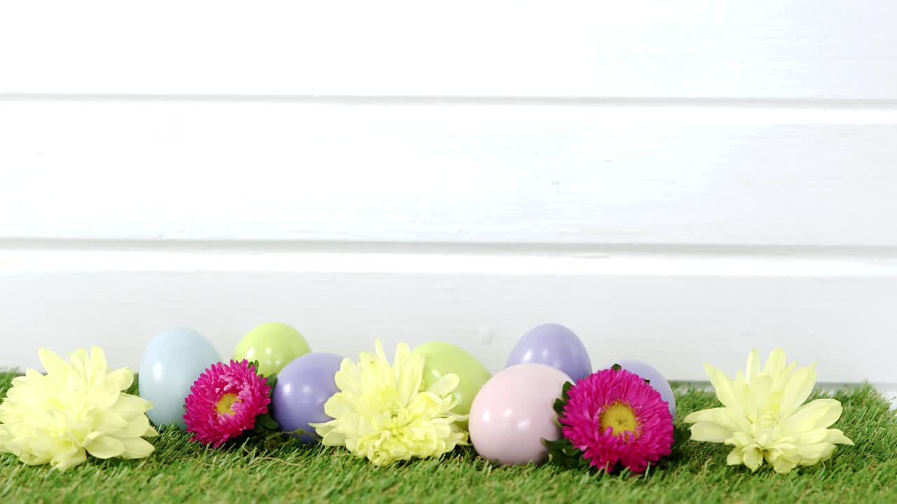 Painted Easter egg on grass
