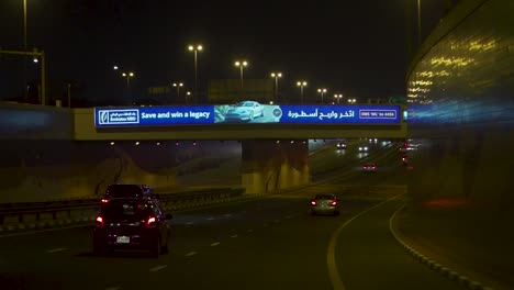 night view of a highway tunnel with traffic