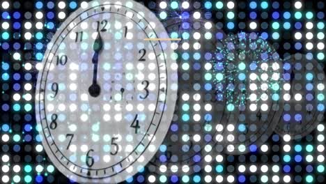 Animation-of-happy-new-year-text-with-fireworks-exploding-and-glowing-spots-over-moving-clock