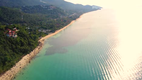 4K-Aerial-Front-View-of-Surin-Beach,-Phuket