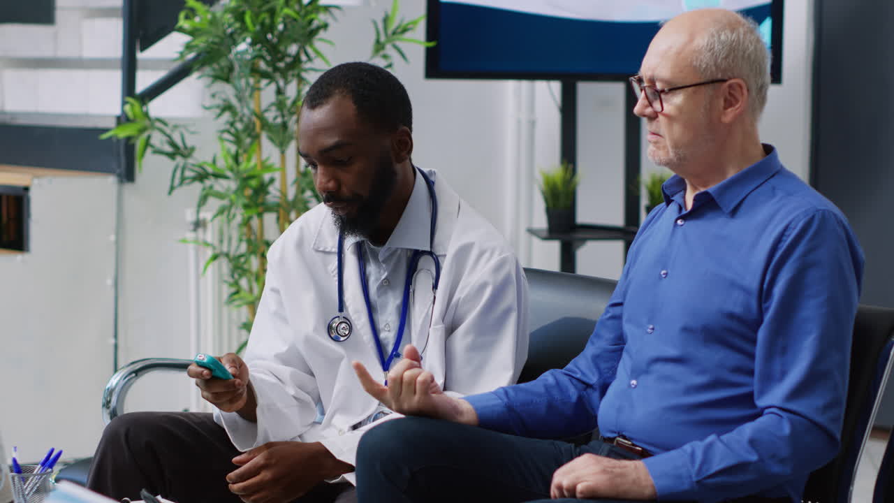 Doctor examining senior patient with pulse oximeter