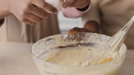 family baking pancakes