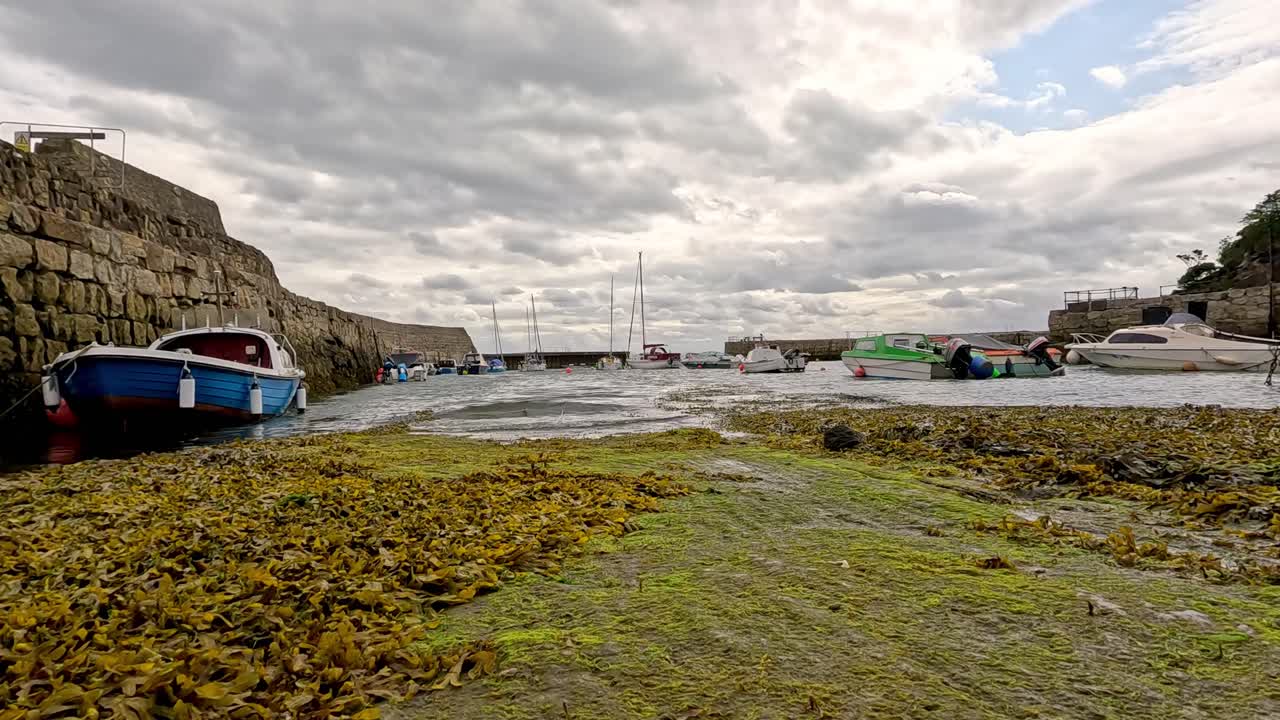 Boat nearing pier in Fife, Scotland