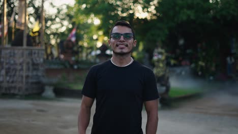 man smiling outdoors