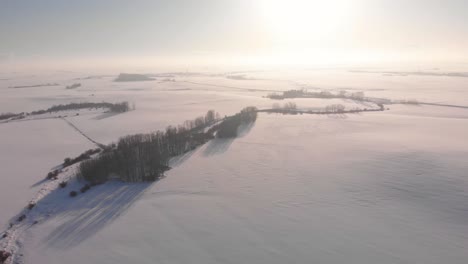 Drone-shot-over-snowed-Canadian-prairies-in-Alberta