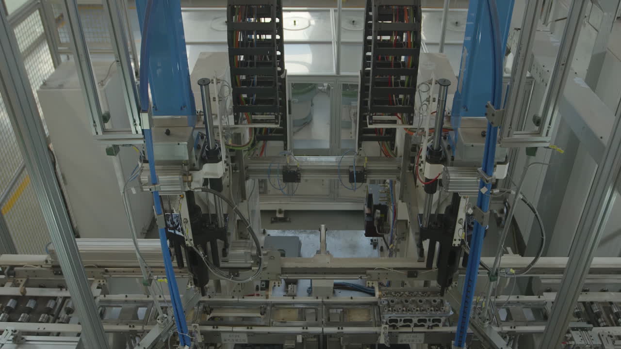 Robotic arms and advanced machinery equipment assembly line with Advanced High Precision Robot Arm inside Bright Electronics plant intricate components in a modern manufacturing facility